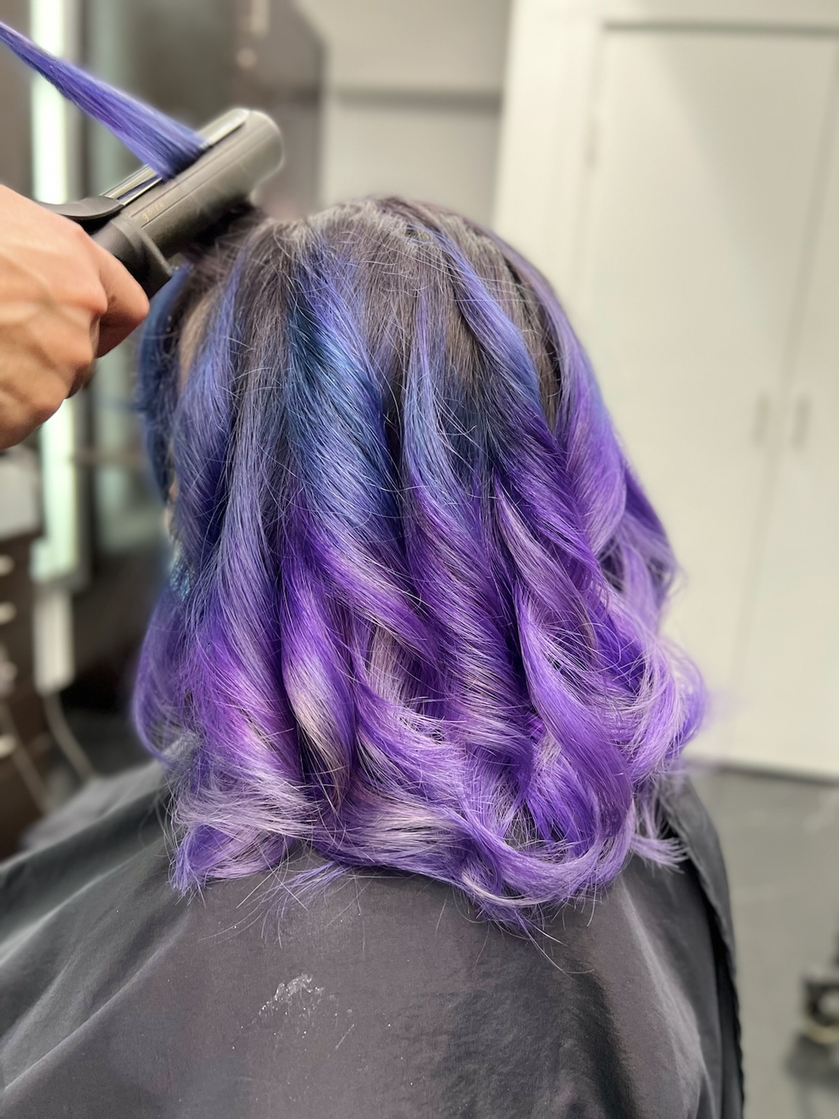 curling purple hair